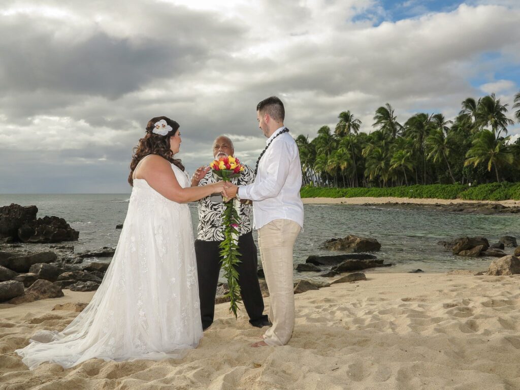 A Beautiful Hawaiian Wedding in Hawaii. Photo by S. Young of Dream Weddings Hawaii. www.hawaiiloaweddings.com. Wedding ceremony, Vow renewal ceremony, elopement ceremony, beach ceremony on Oahu, Hawaii