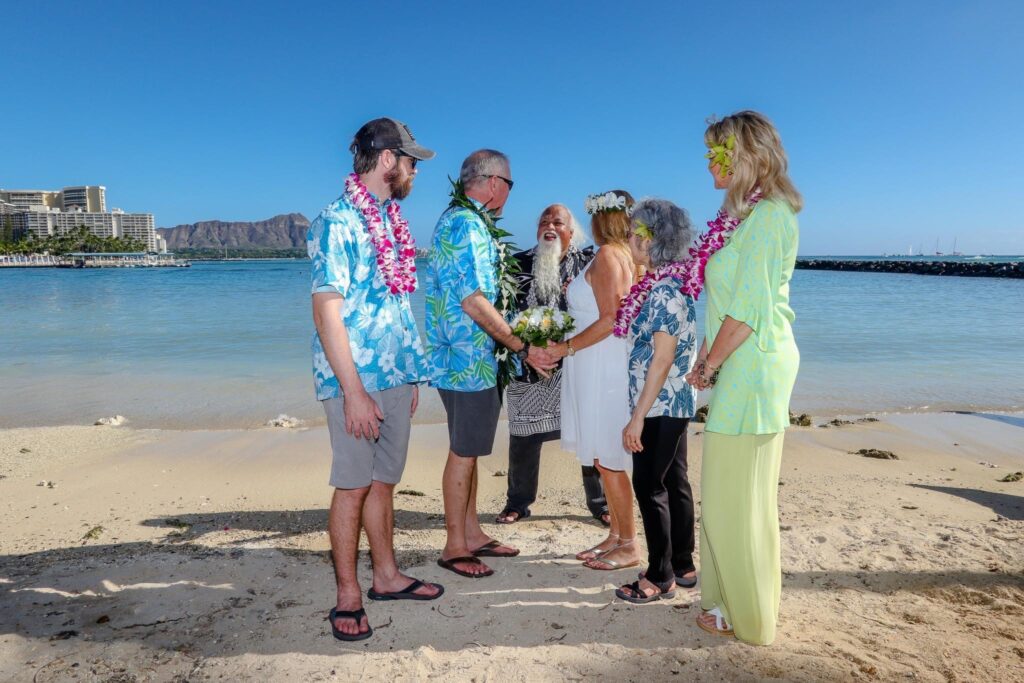 A Beautiful Hawaiian Wedding in Hawaii. Photo by S. Young of Dream Weddings Hawaii. www.hawaiiloaweddings.com. Wedding ceremony, Vow renewal ceremony, elopement ceremony, beach ceremony on Oahu, Hawaii